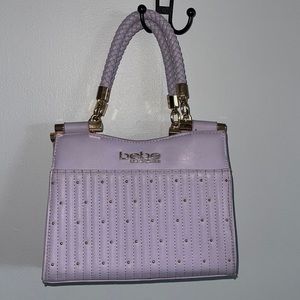 Bebe small lavender and gold handbag also will throw a lavender mini wallet in